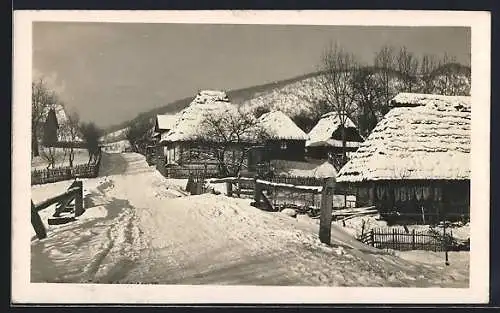 AK Volovec, Schneebedeckte Wohnhäuser