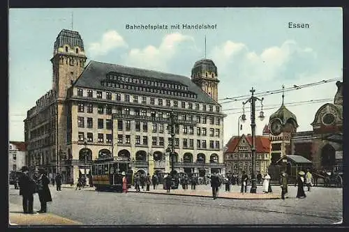 AK Essen, Bahnhofsplatz mit Handelshof und Strassenbahn