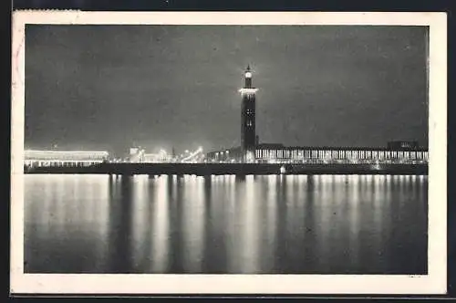 Künstler-AK Köln, Deutsches Turnfest 1928, Beleuchtetes Festhallen-Panorama vom Wasser aus