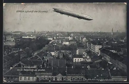 AK Düsseldorf, Zeppelin über der Stadt, von der Petruskirche aus gesehen