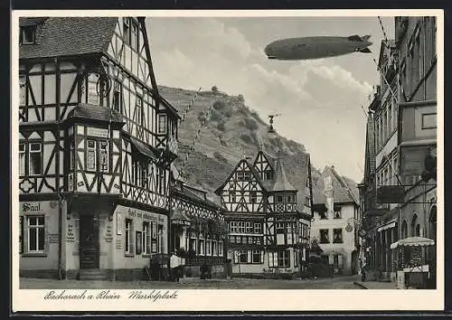 AK Bacharach, Luftschiff Zeppelin über dem Marktplatz, Hotel zum altkölnischen Saal