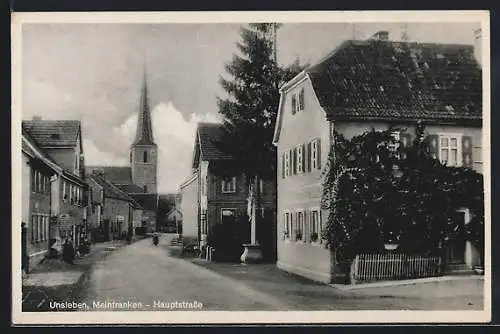 AK Unsleben /Mainfranken, Hauptstrasse mit Blick zur Kirche