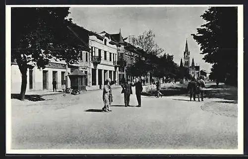 AK Mukacevo, Strassenpartie mit Blick zur Kirche