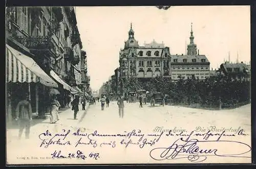 AK Mannheim, Blick in die Breitestrasse mit Strassenbahnen im Hintergrund