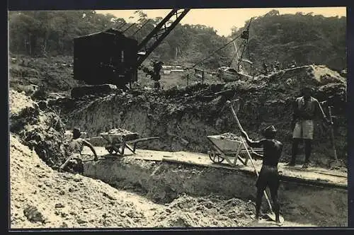 AK Kalima, Symétain, Extraction manuelle du gravier alluvionnaire stannifère