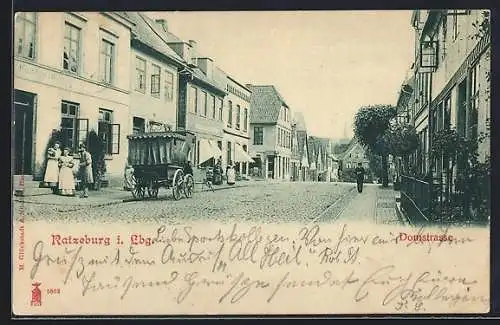 AK Ratzeburg i. Lbg., Domstrasse mit Geschäften, Kutsche, Turmblick