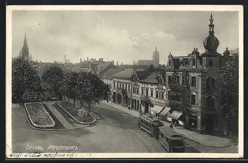 AK Dessau, Albrechtsplatz mit Geschäft und Strassenbahn