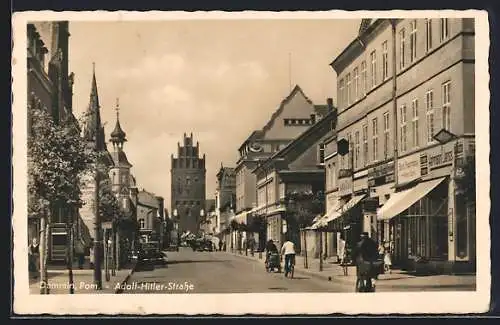 AK Demmin /Pom., Strasse mit Geschäften