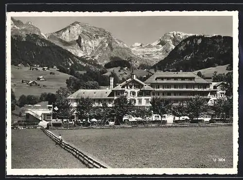 AK Unterwasser, Teilansicht mit Hotel Sternen und Gebirgskette im Hintergrund