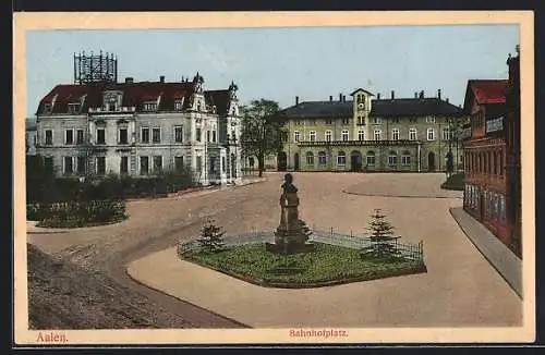 AK Aalen, Bahnhofplatz mit Bahnhof und Denkmal