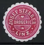 Präge-Reklamemarke Linz, Drogerie Josef Sterrer