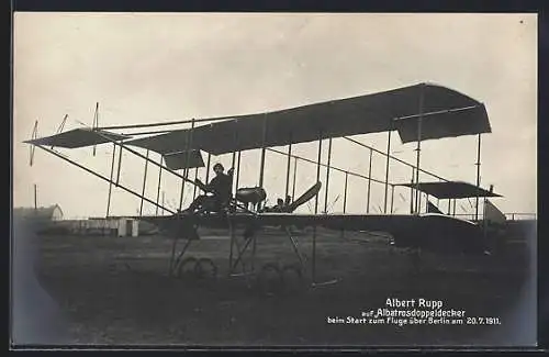 AK Albert Rupp auf Albatrossdoppeldecker-Flugzeug beim Start 1911