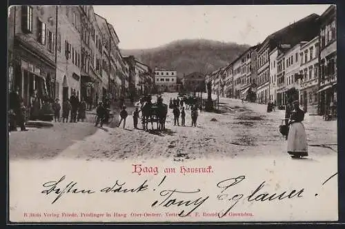 AK Haag am Hausruck, Strassenpartie mit Kutsche, Denkmal und Bergblick