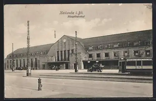 AK Karlsruhe i. Bd., Autos vor dem Hauptbahnhof