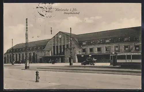 AK Karlsruhe i. Bd., Hauptbahnhof mit Strassenbahn