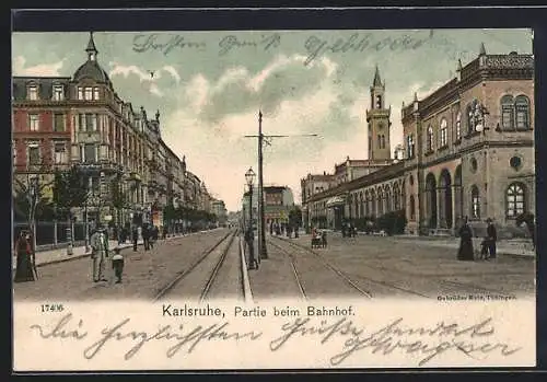 AK Karlsruhe, Strassenpartie beim Bahnhof, mit Turm