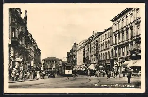 AK Hannover, Strasse mit Geschäften und Strassenbahn
