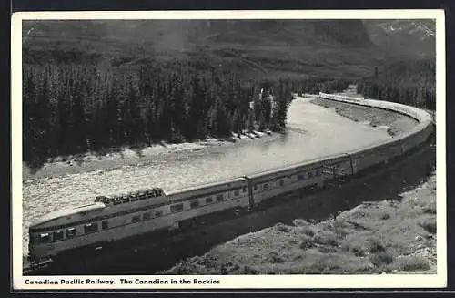 AK Canadian Pacific Railway, The Canadian in the Rockies, Eisenbahn fährt an Fluss und Wäldern entlang