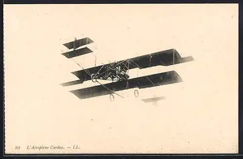 AK L`Aeroplane Curtiss, Doppeldecker-Flugzeug am Himmel