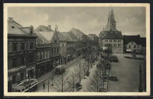 AK Louny, Strassenpartie mit Bussen