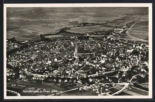 AK Nördlingen, Teilansicht mit Kirche, Fliegeraufnahme