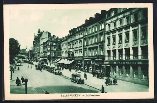 AK Saarbrücken, Reichsstrasse mit Strassenbahn