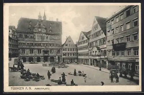 AK Tübingen, Partie am Marktplatz mit Brunnen und Warengeschäften