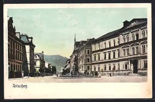 AK Tetschen-Bodenbach-Decin, Strassenpartie mit Denkmal