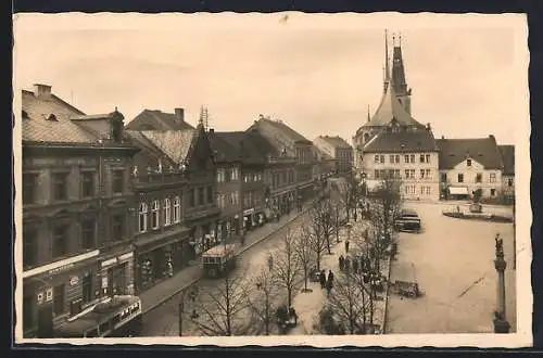 AK Laun, Strassenpartie mit Bussen