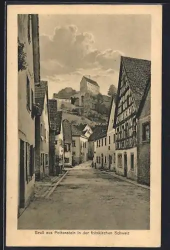 AK Pottenstein /Fränk. Schweiz, Strassenpartie mit Burgblick