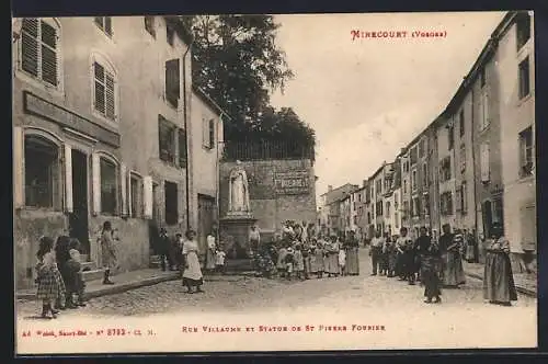 AK Mirecourt, Rue Villadé et Statue de St Pierre Fourier