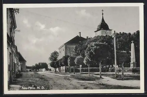 AK Pölla /N.-Oe., Neu-Pölla, Strassenpartie mit Kirche