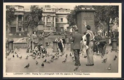 AK London, Posing for a photograph with the pigeons in Trafalgar Square