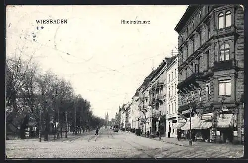 AK Wiesbaden, Rheinstrasse mit Geschäften, Strassenbahn