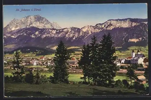 AK St. Johann in Tirol, Ortsansicht über Bäume hinweg