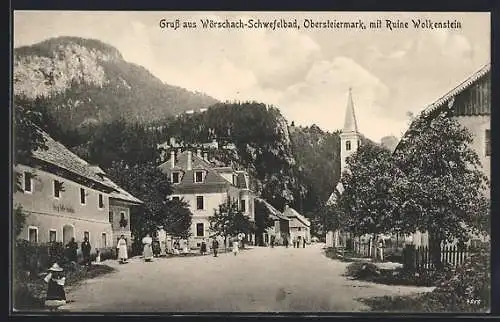 AK Wörschach, Strassenpartie mit Blick auf Kirche und Ruine Wolkenstein