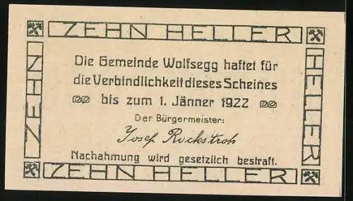 Notgeld Wolfsegg 1922, 10 Heller, Waldlandschaft mit Gemeindegebäude und Bergmannswerkzeuge