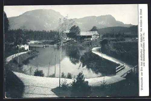 AK Kössen in Tirol, Promenade am See des Gasthofes zur Kapelle mit Unterbergerhorn