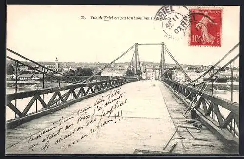 AK Triel, Vue de Triel en passant son pont suspendu