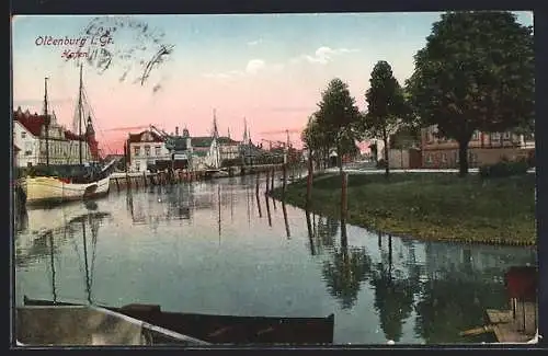 AK Oldenburg i. Gr., Blick in den Hafen mit Schiff