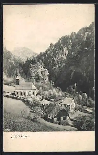 AK Johnsbach, Häuser und Kirche, Blick in die Bergwelt