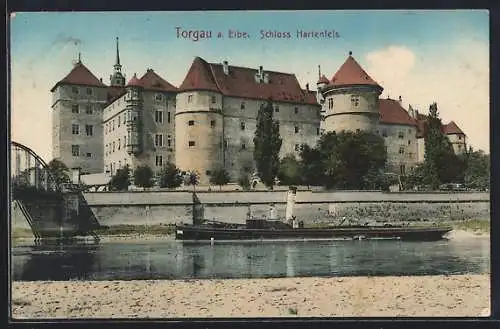 AK Torgau, Ansicht vom Schloss Hartenfels mit Dampfschiff auf der Elbe