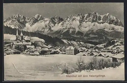 AK Kitzbühel, verschneite Ortsansicht mit Kaisergebirge