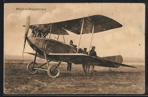 Foto-AK Sanke Nr. 37: Albatross-Doppeldecker und Pilot auf einer Wiese