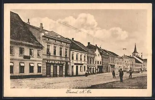 AK Gmünd, Strassenpartie mit Geschäften und Turm