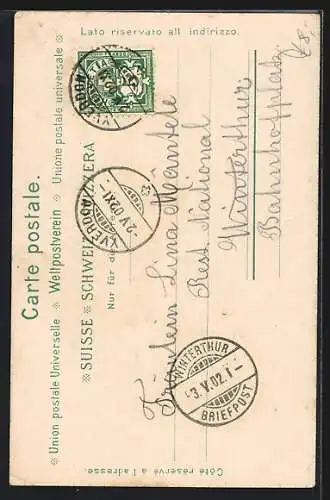 AK Wallis, Frau in Tracht, Im Hintergrund Kapelle