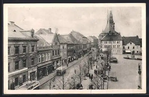 AK Louny, Strassenpartie mit Bussen