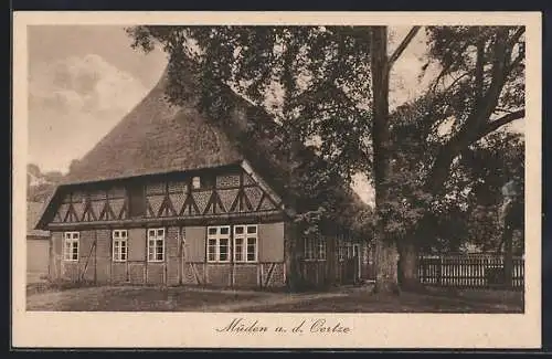 AK Müden a. d. Oertze, Strassenpartie an einem Wohnhaus