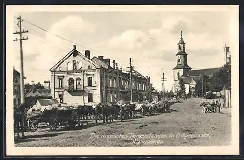 AK Stallupönen /Ostpreussen, Strassenpartie mit Ruine, Fuhrwerken und Kirche, Die russischen Verwüstungen