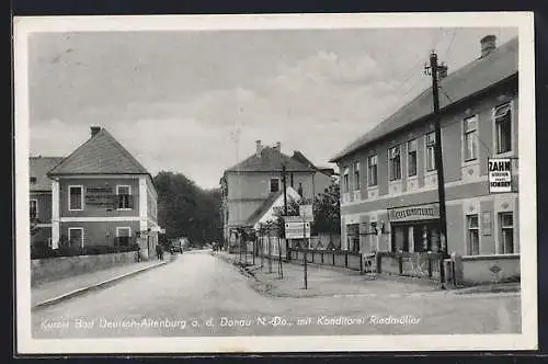 AK Bad Deutsch-Altenburg a. d. Donau /N.-Do., Strassenpartie mit Konditorei Riedmüller